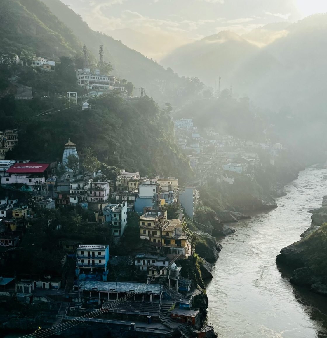 pexels photo 14392872 14392872 Scenic aerial view of Devprayag where rivers meet, surrounded by mountains.
