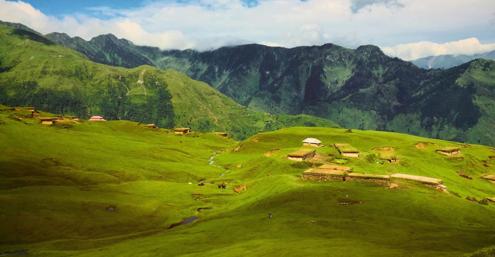 pexels photo 2907578 2907578 Breathtaking view of lush green hills and mountains in Haveli Azad Kashmir, perfect for a nature escape.